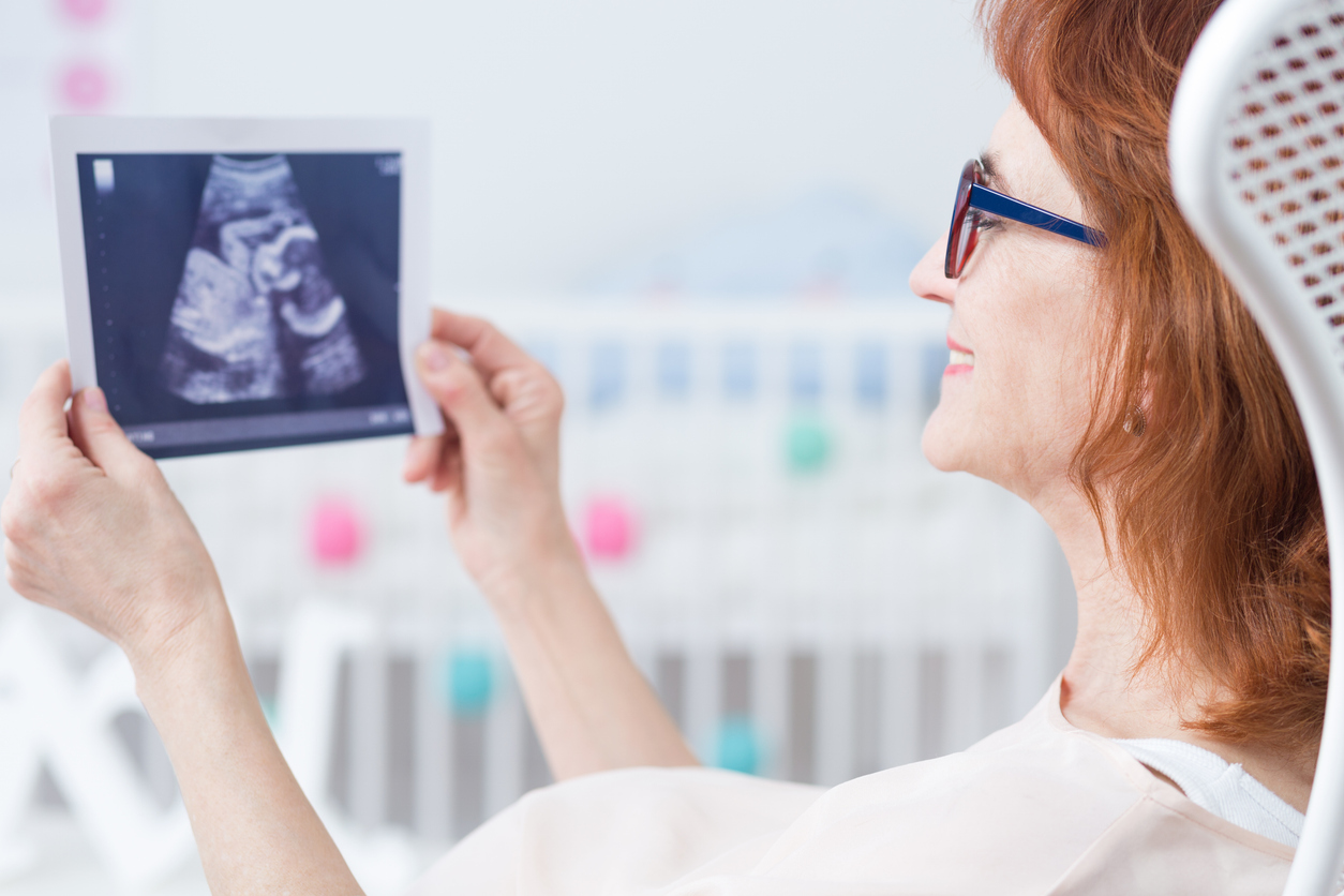 Looking at first baby's photo
